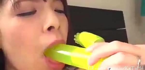  Young Lady with Big Tits Teases and Plays with a Yellow Green Dildo Vibrator